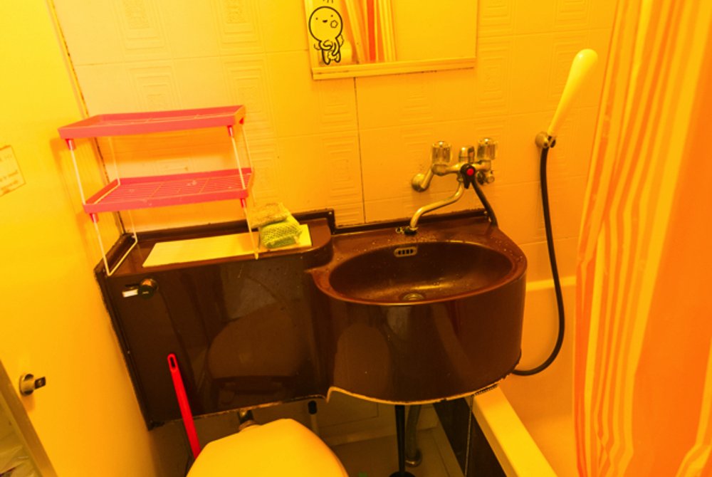 Bathroom with sink, toilet, shower, and bathtub